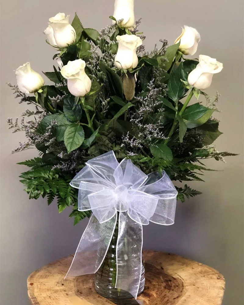 Dozen Long Stem White Rose Floral Arrangement from $75-$150