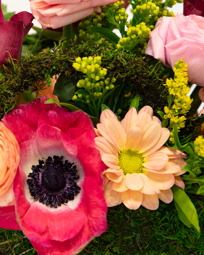 Moss & Bloom Garden Purse Arrangement from $85-$100